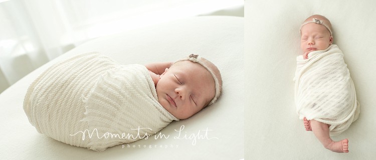 newborn baby swaddled in white by window light