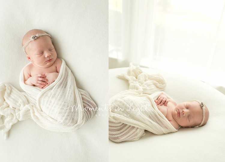 newborn baby girl posed naturally in white swaddle