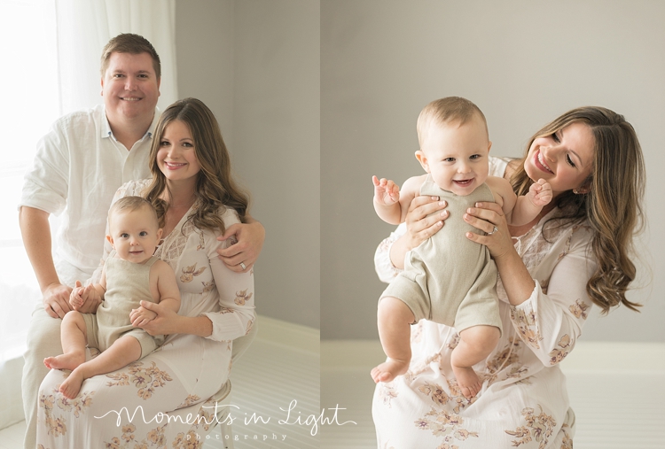family photos with baby boy by window in Houston photo studio